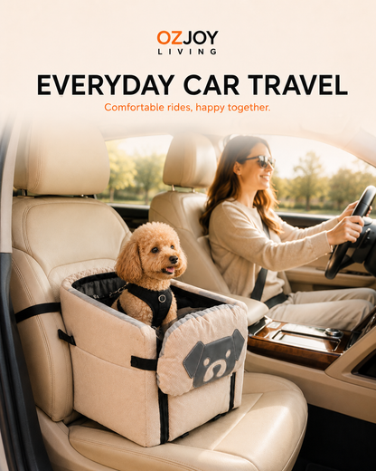 Small dog sitting in OZJOY beige pet car booster seat during car travel
